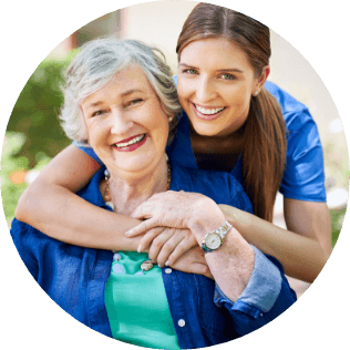Woman getting hug by caregiver