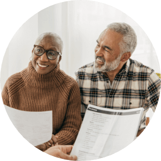 Elderly Couple Reviewing Documents