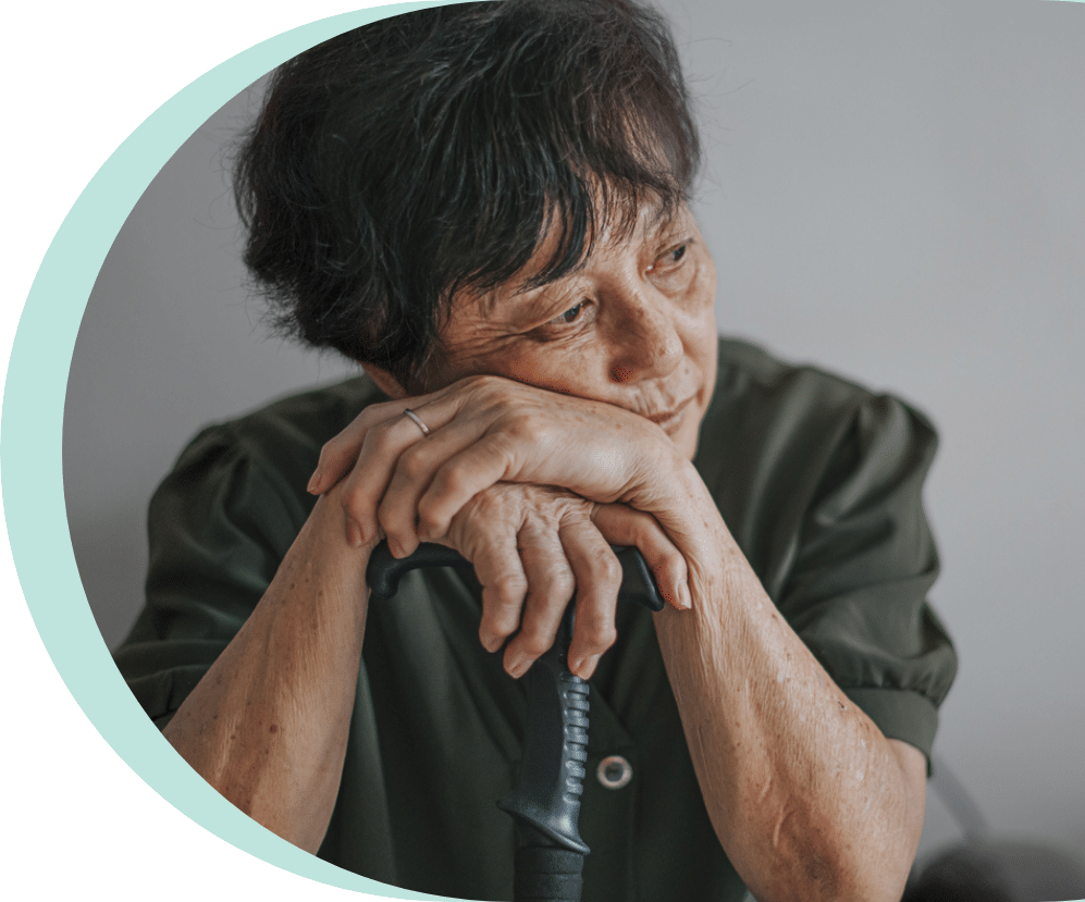 older woman with a frown on her face while struggling with depression in seniors